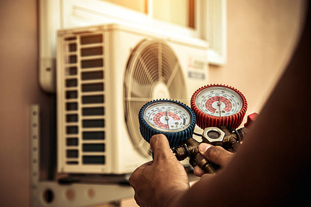 Professional Heat Pump Repair technician working in Marble Hill, GA